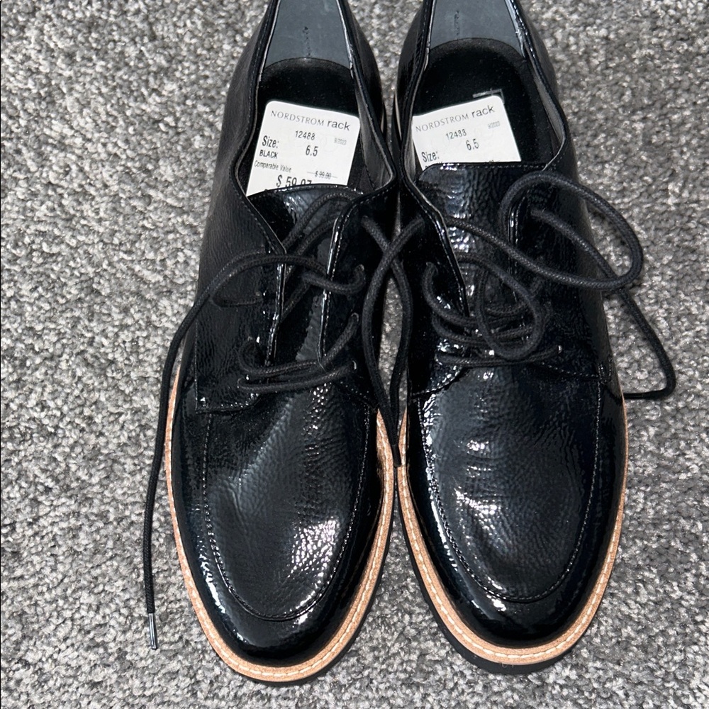 Franco Sarto Black Moccasins with Tan Sole